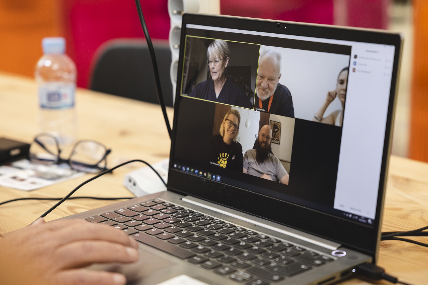 Image of an Online Conultatiom meeting on laptop